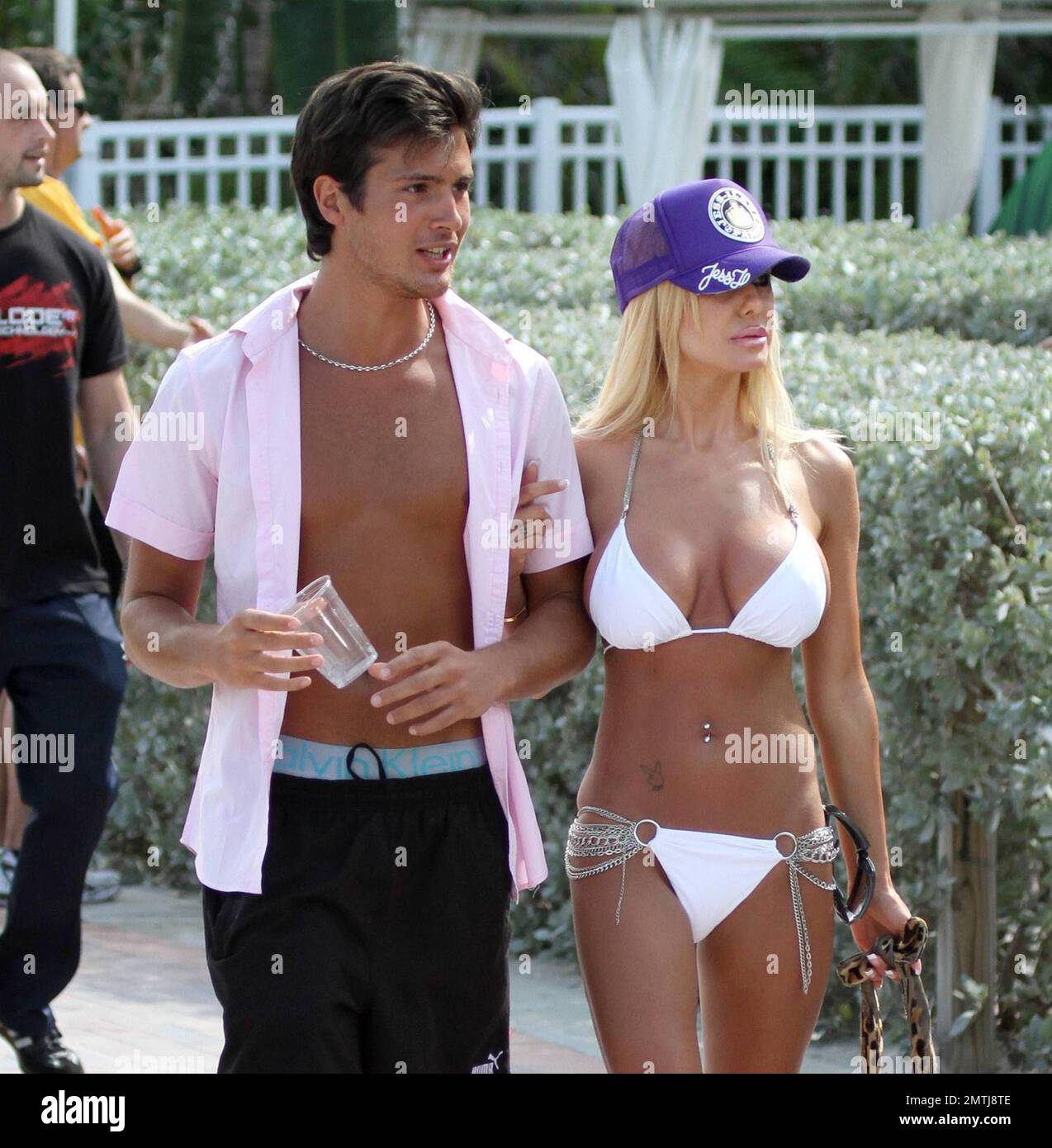 Shauna Sand takes a stroll on the boardwalk with yet another handsome