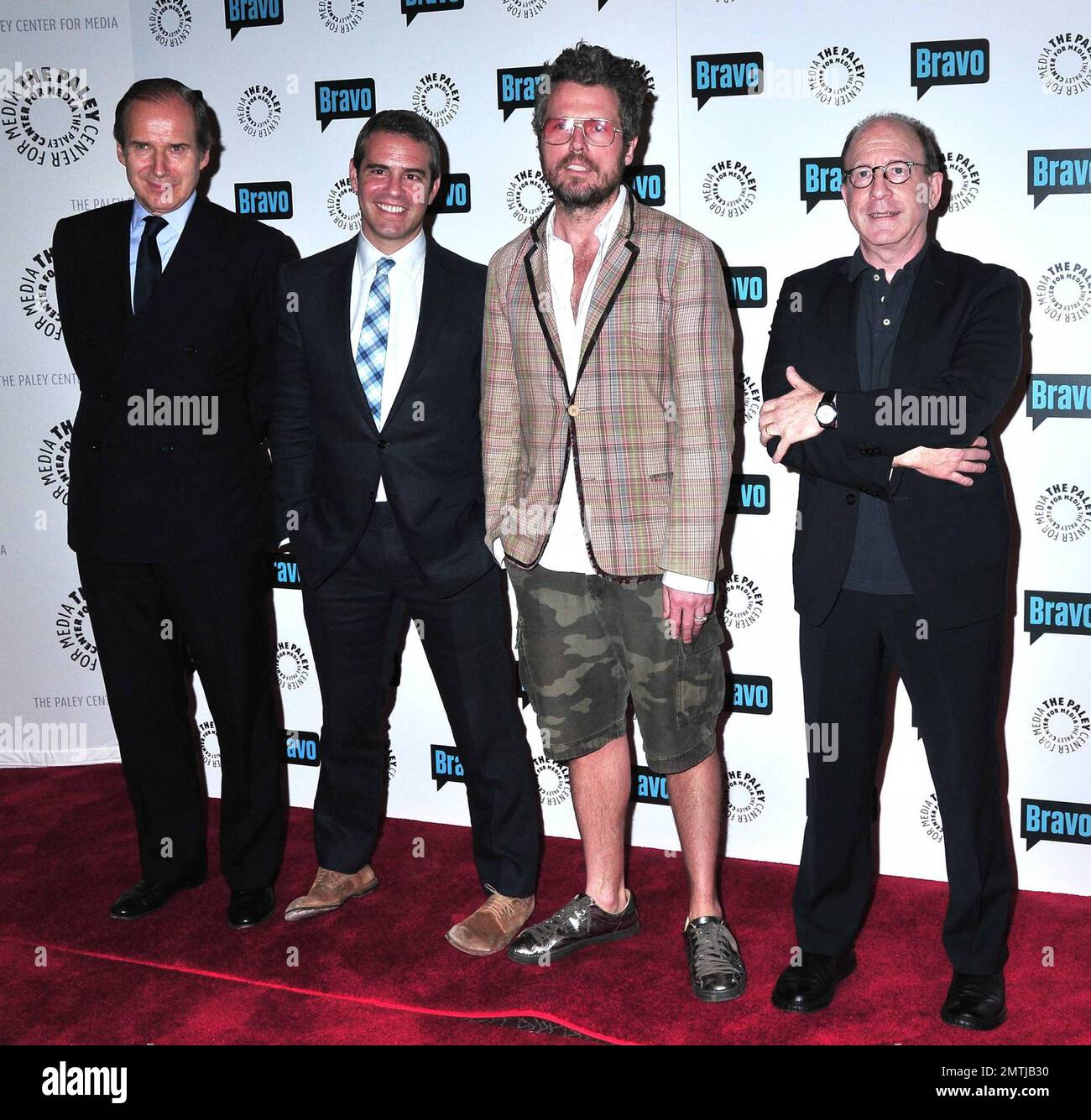 Art auctioneer and dealer Simon de Pury, producer Dan Cutforth, Bill Powers  and art critic Jerry Saltz arrive to the launch party of Bravo's new art  reality TV series Work of Art
