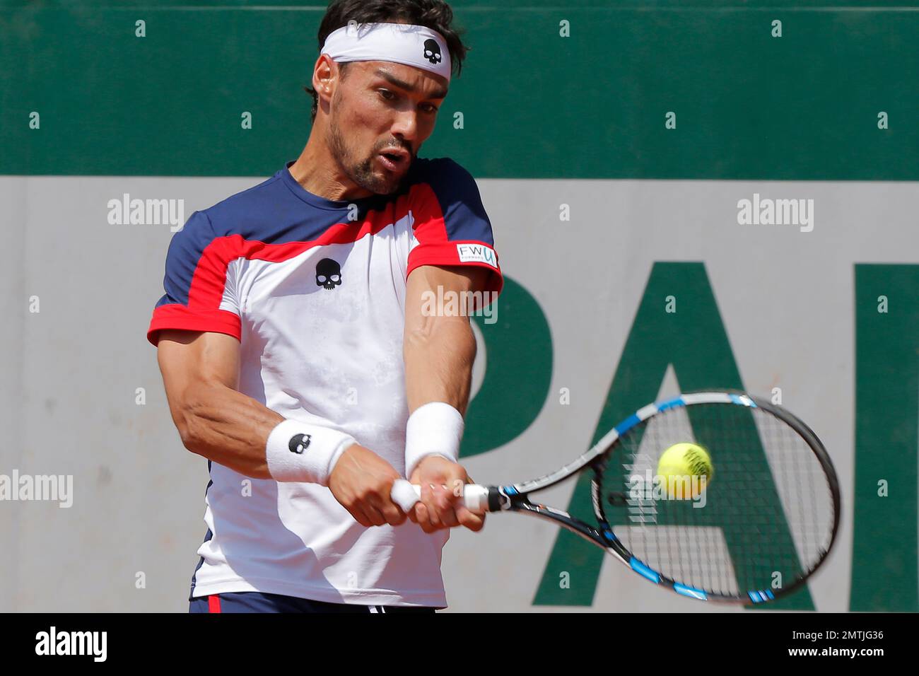 Italy's Fabio Fognini returns the ball to compatriot Andreas Seppi during  their second round match of the French Open tennis tournament at the Roland  Garros stadium, Thursday, June 1, 2017 in Paris. (