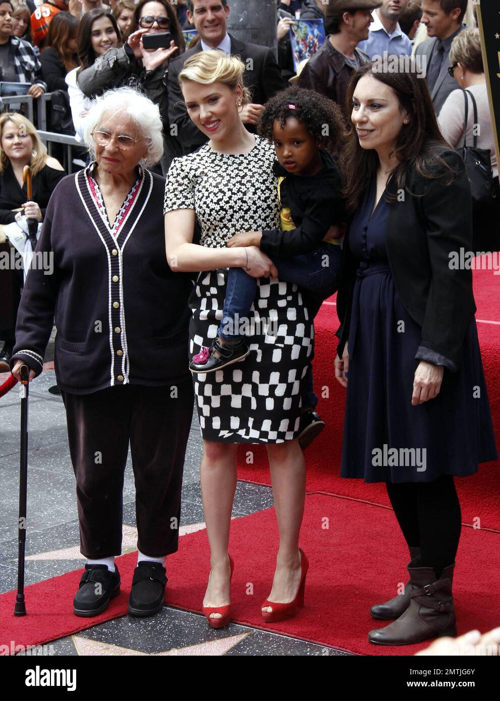 The Avengers" star Scarlett Johansson is presented with a star on the  Hollywood Walk of Fame during a ceremony in LA. Johansson was joined by  actors Jeremy Renner and Clark Gregg, among