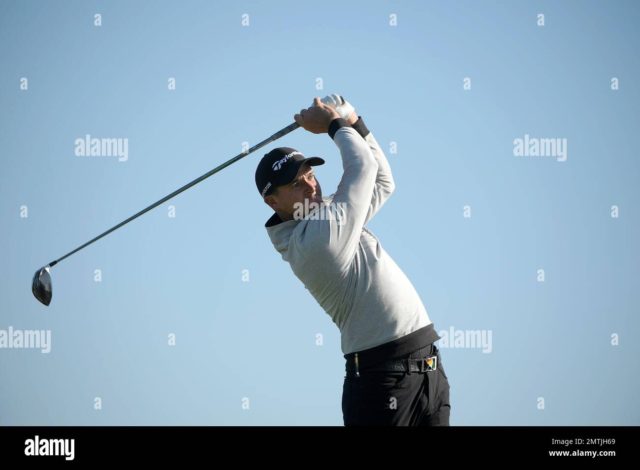 Sam Saunders, grandson of Arnold Palmer, watches his tee shot on the