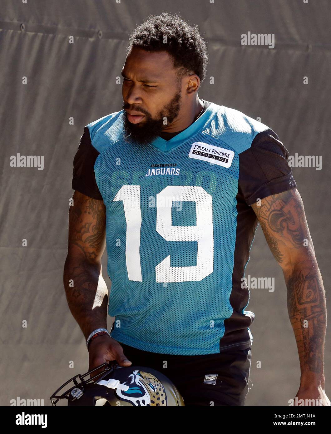 Jacksonville Jaguars wide receiver Jamal Robinson (19) walks to the ...