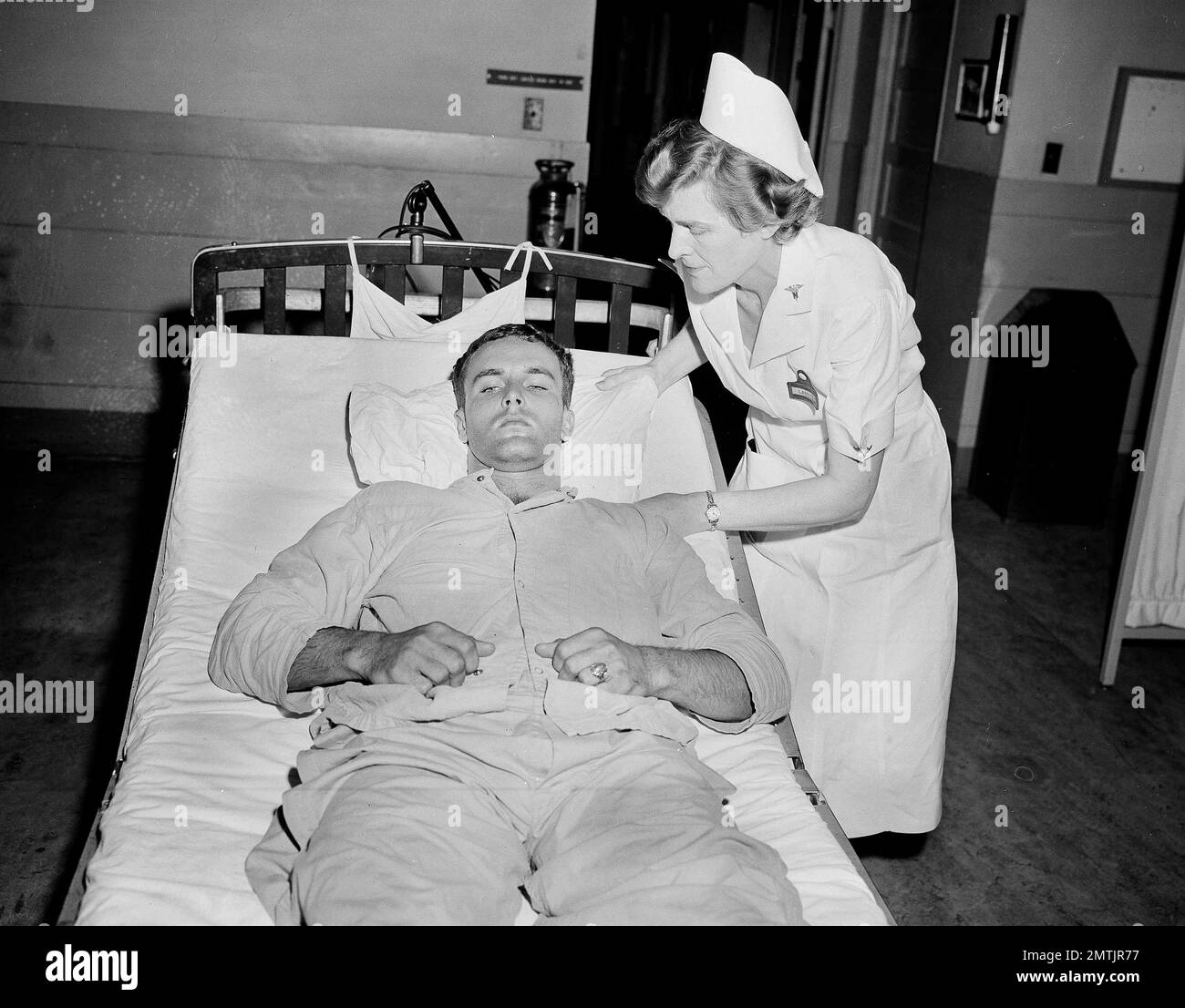 Pvt. Thomas F. Kiley of Lawrence, Mass., who stumbled from wrecked ...