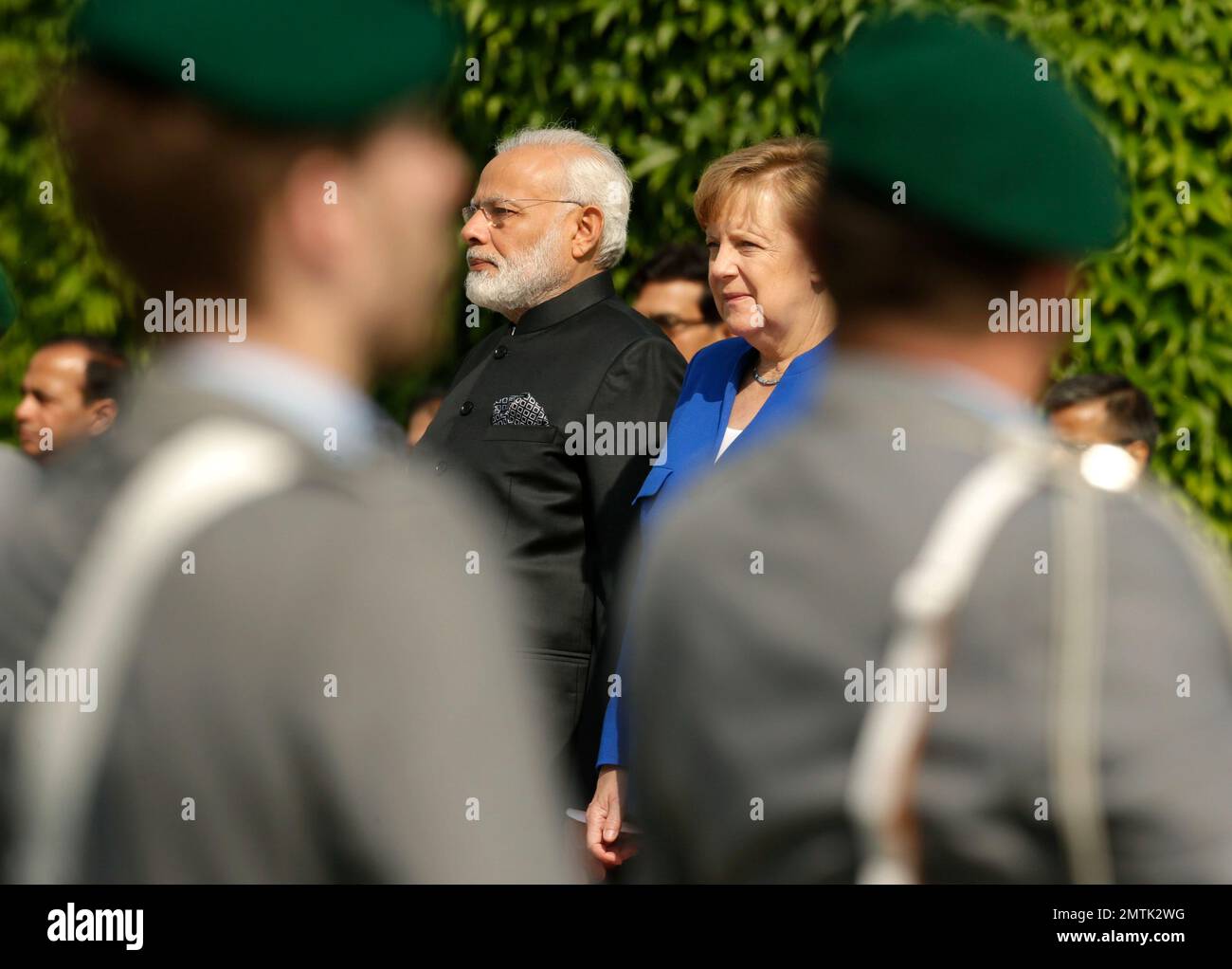Modi Listen German Chancellor Angela Merkel, right, and Indian Prime Minister ...