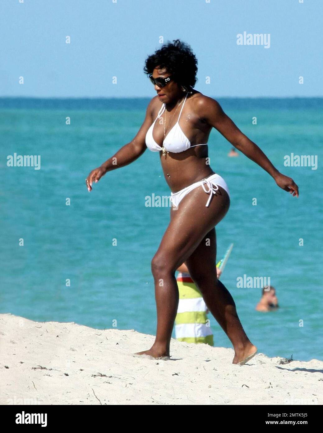 Exclusive!! Serena Williams doesn't seem concerned about losing her WTA No.  1 ranking as she donned a bikini to catch some rays with BFF Kelly Rowland  and some other friends on South