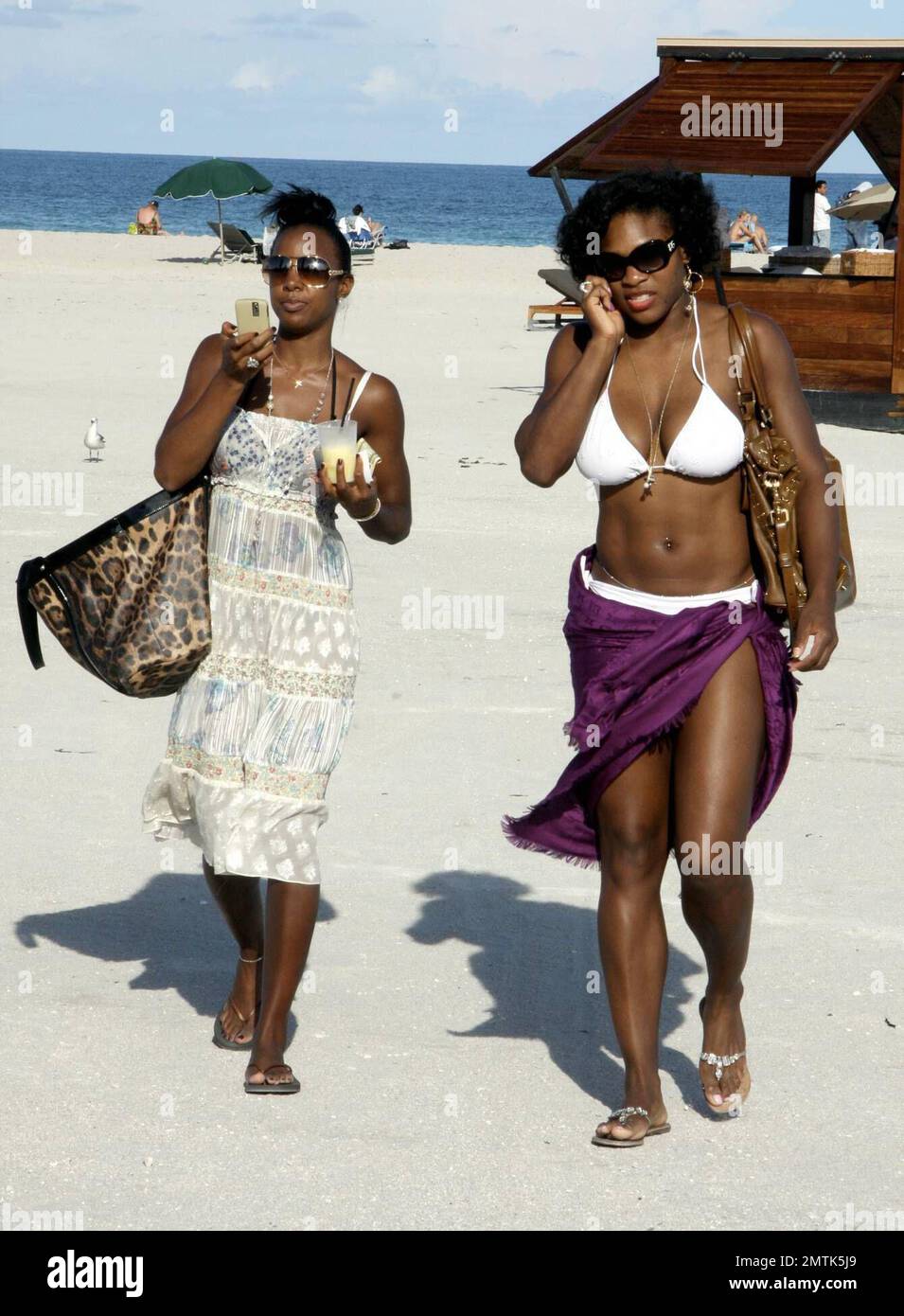 Serena Williams doesn't seem concerned about losing her WTA No. 1 ranking  as she donned a bikini to catch some rays with BFF Kelly Rowland and some  other friends on South Beach.