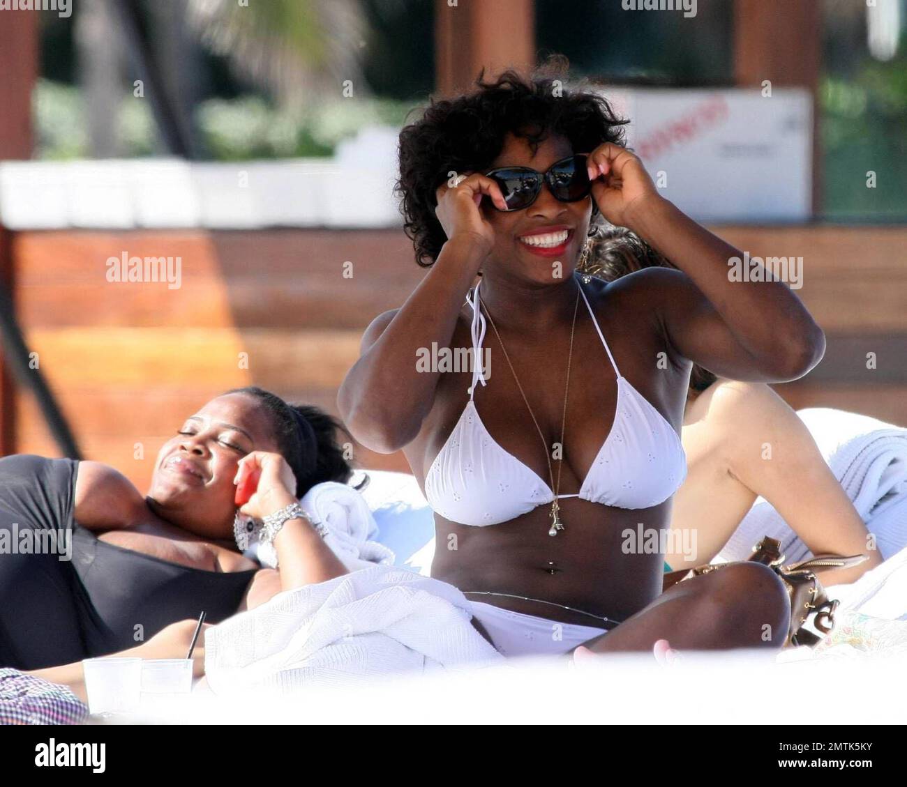 Serena Williams doesn't seem concerned about losing her WTA No. 1 ranking  as she donned a bikini to catch some rays with BFF Kelly Rowland and some  other friends on South Beach.