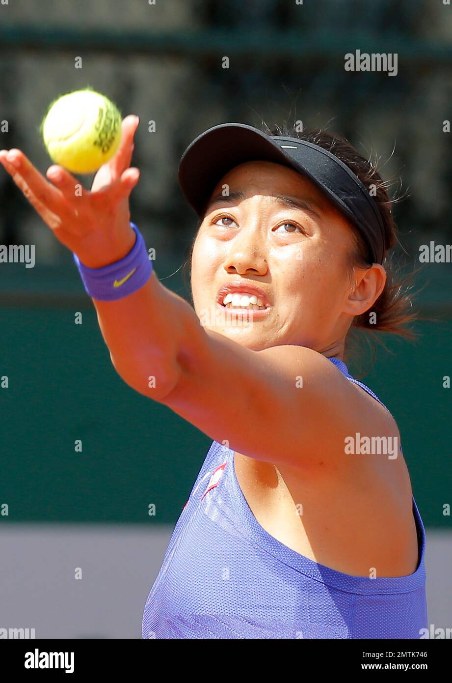 China's Shuai Zhang serves the ball to Croatia's Donna Vekic during ...