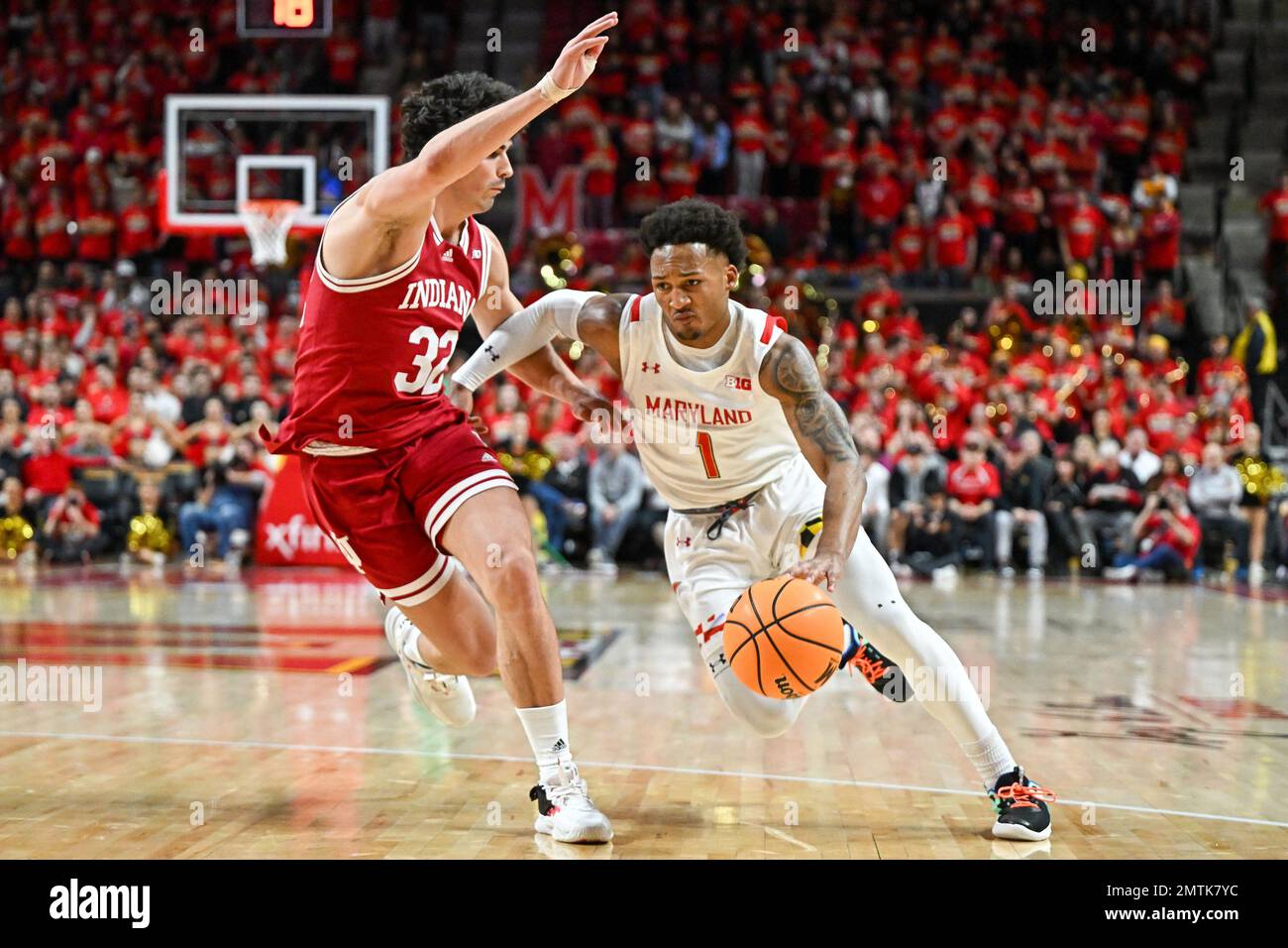 College Park, MD, USA. 31st Jan, 2023. Maryland Terrapins guard Jahmir Young (1) dribbles the ball past Indiana Hoosiers guard Trey Galloway (32) during the NCAA basketball game between the Indiana Hoosiers and the Maryland Terrapins at Xfinity Center in College Park, MD. Reggie Hildred/CSM/Alamy Live News Stock Photo