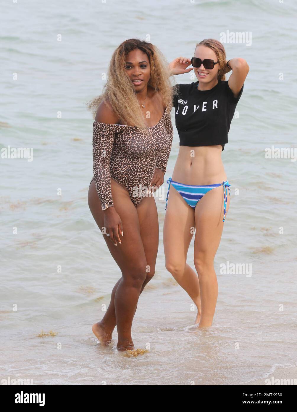 Tennis players Serena Williams and Caroline Wozniacki are spotted in Miami  Beach enjoying the day with friends. Serena is seen wearing an animal print  unitard swimsuit while Caroline sports an blue stripe