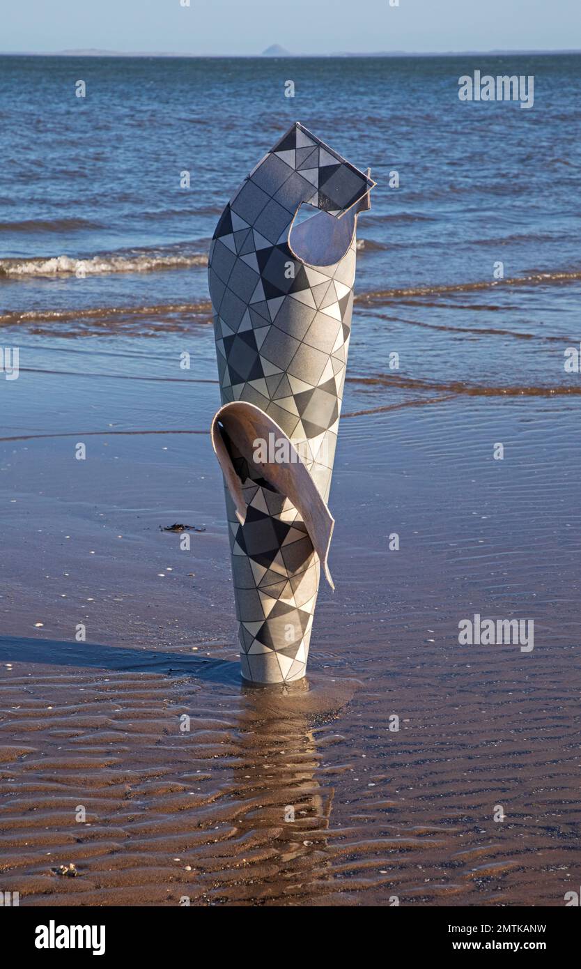 Portobello, Edinburgh, Scotland, UK. 1st February 2023. Chilly sunshine and  7 degrees with real feel 2 degrees centigrade at the seaside by the Firth of Forth. Pictured: Beach Art or beach pollution on the shore of the Firth of Forth. Credit: Scottishcreative/alamy live news. Stock Photo