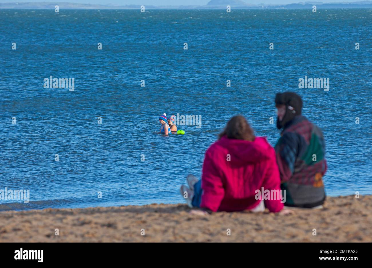 Portobello, Edinburgh, Scotland, UK. 1st February 2023. Chilly sunshine and  7 degrees with real feel 2 degrees centigrade at the seaside by the Firth of Forth. Credit: Scottishcreative/alamy live news. Stock Photo