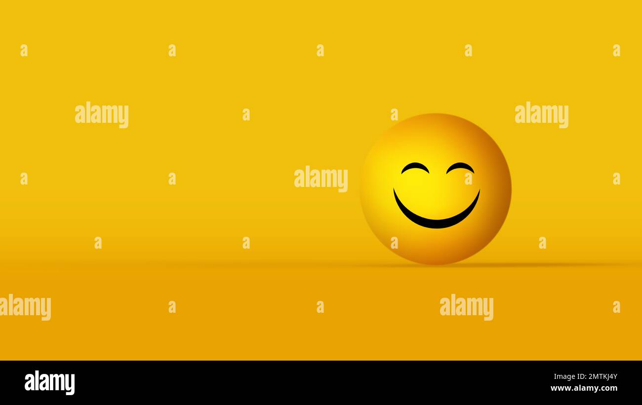 bright yellow smiley in the form of a ball on a yellow background Stock Photo