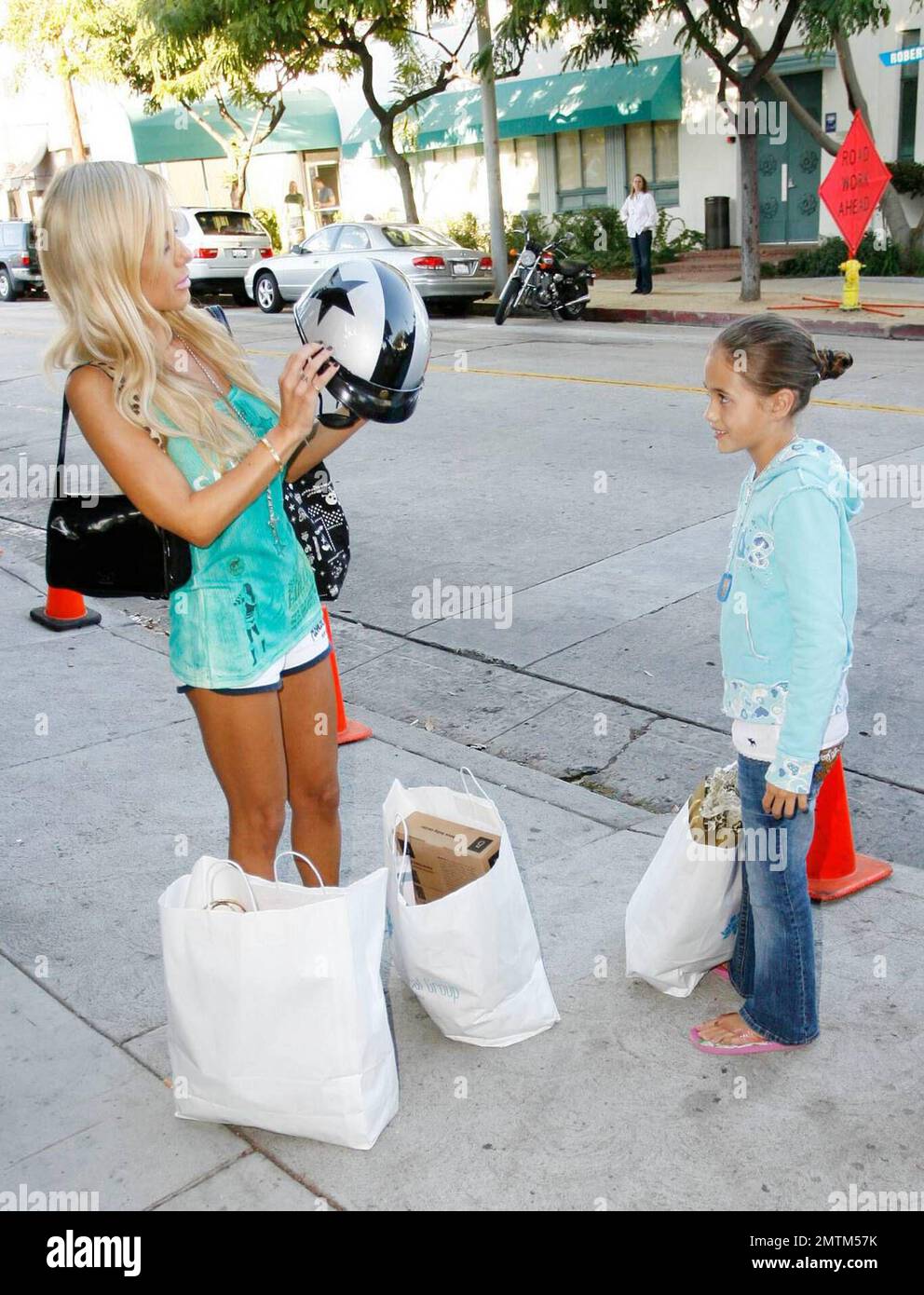 Shana Sand with her daughters and boyfriend shop at the Chanel store on Robertson  Blvd. and then stroll down the street past The Ivy. Los Angeles, CA. 6/1/08  Stock Photo - Alamy