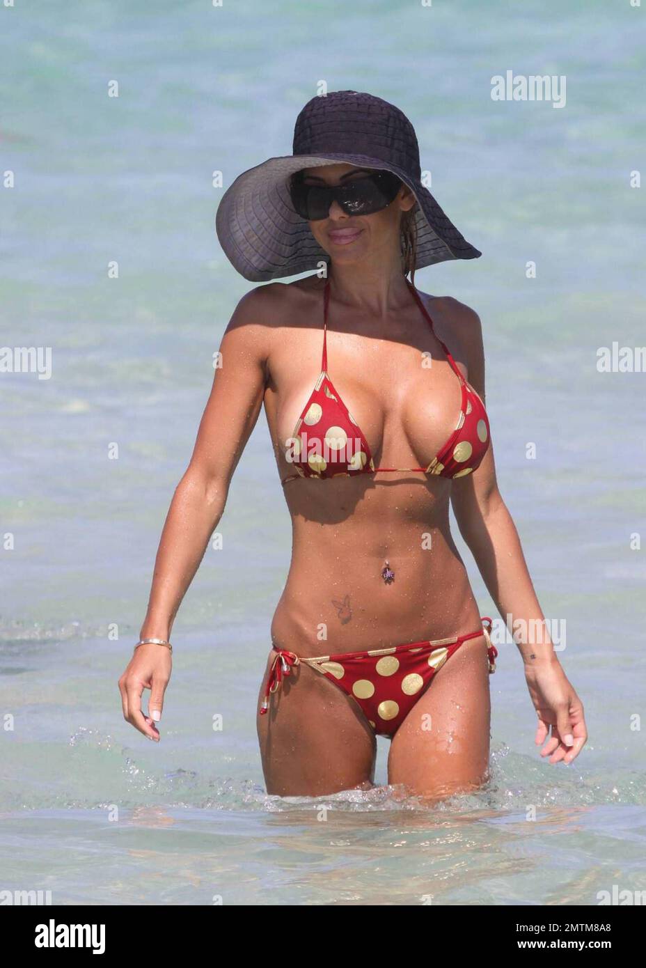 Playboy Playmate Shauna Sand spends the day on Miami Beach with her new  beau. After a quick bikini change for Shauna, the couple swam in the warm  ocean and shared some tender