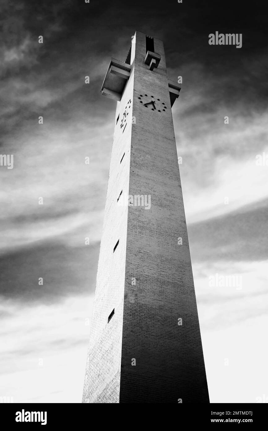 The 65 meters high cross-shaped bell tower of Lakeuden Risti church by Alvar Aalto. Built 1957–1960. Seinajoki, Finland. Monochrome conversion. Stock Photo