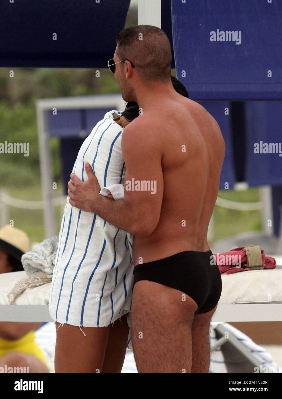 Diego Simeone and wife Carolina Baldini show off their toned bodies on the  beach. Miami, FL. 7/17/10 Stock Photo - Alamy