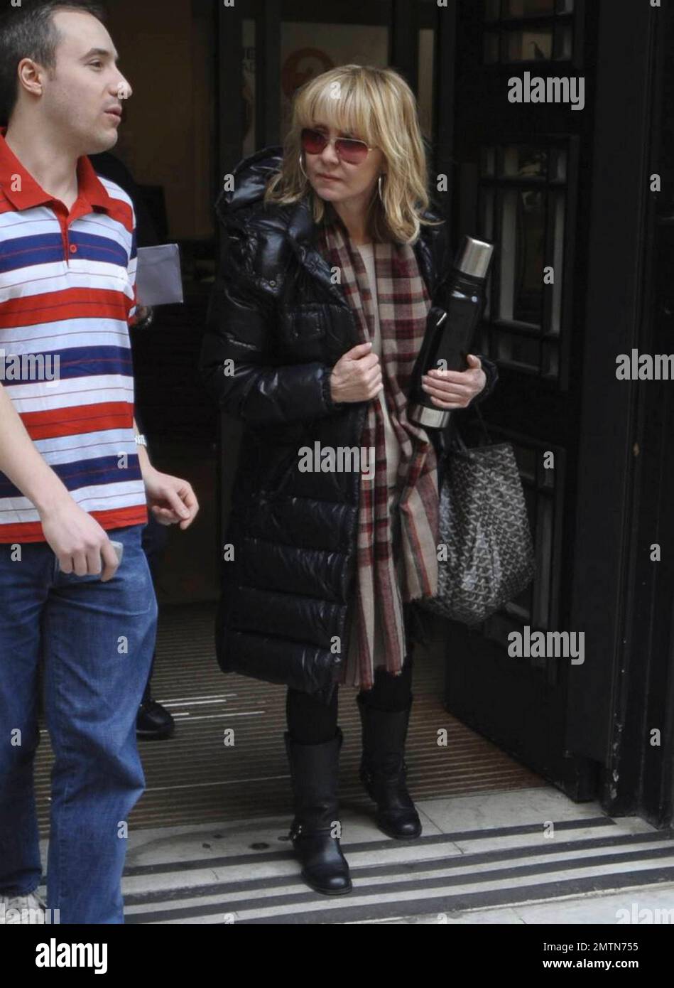 Scottish singer, TV and radio personality Lulu Kennedy-Cairns, 61, is all smiles as she leaves BBC Radio 2 studios wearing cool leather biker boots.  Lulu, who is best known for her hit song 'To Sir, with Love' is looking great for her age, a topic that is widely discussed on her official website. London, UK. 04/13/10.   . Stock Photo