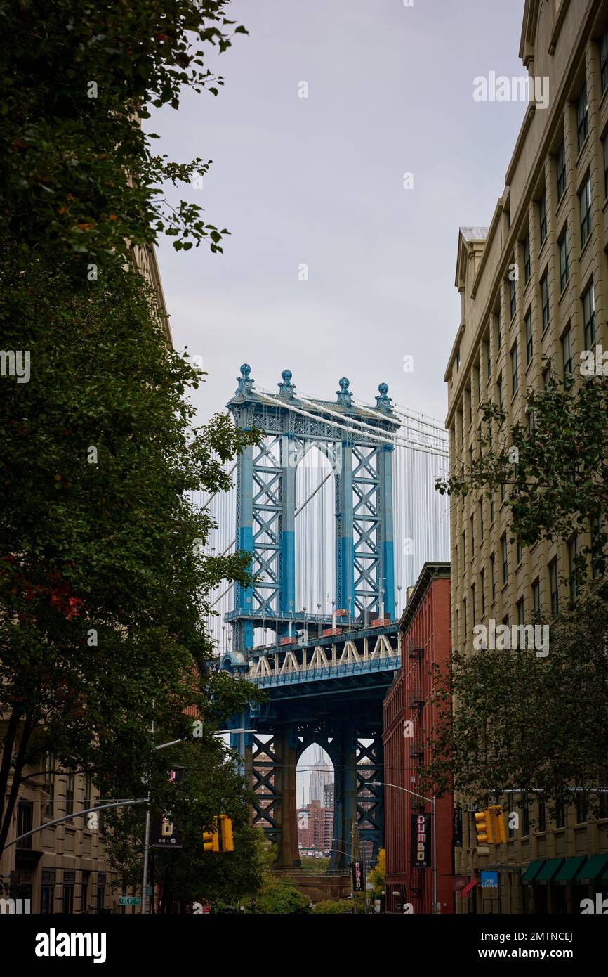 The Manhattan Bridge is a suspension bridge that crosses the East River in New York City and appears in many films such as Once Upon a Time in America. Stock Photo