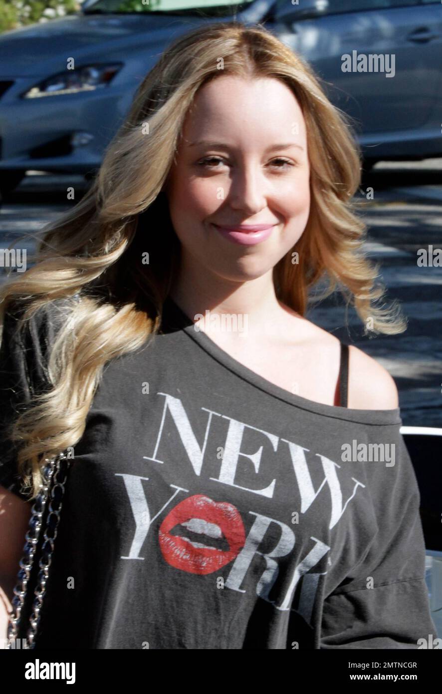 EXCLUSIVE!! - Skyler Shaye, goddaughter to actor Jon Voight, was seen leaving Ken Paves Salon in a black off the shoulder t shirt with New York printed on it, black leggings and paired off with black sneakers. Skyler is best known for her role as Cloe in 'Bratz: The Movie.' Los Angeles, CA. 27th October 2011. Stock Photo