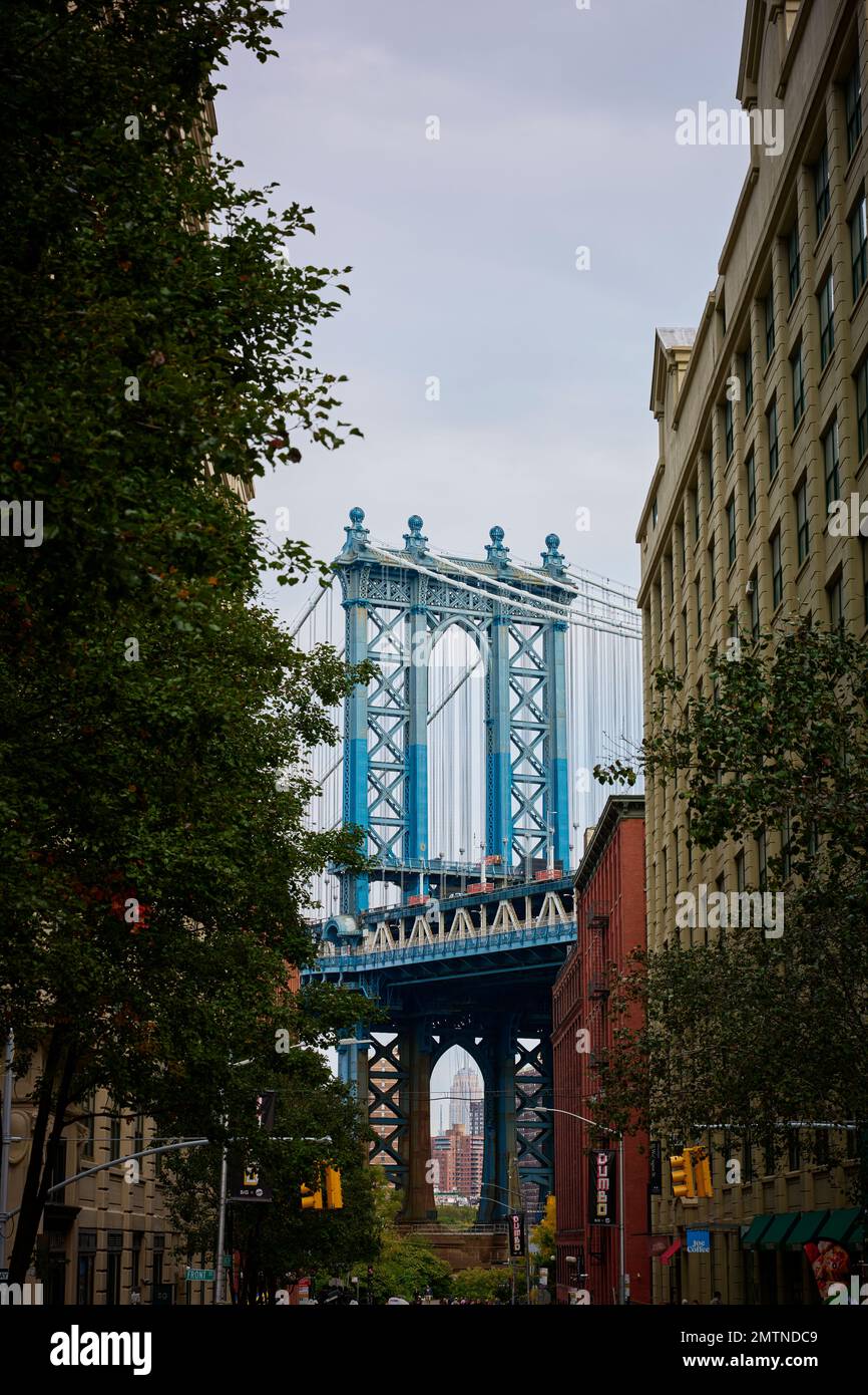 The Manhattan Bridge is a suspension bridge that crosses the East River in New York City and appears in many films such as Once Upon a Time in America. Stock Photo