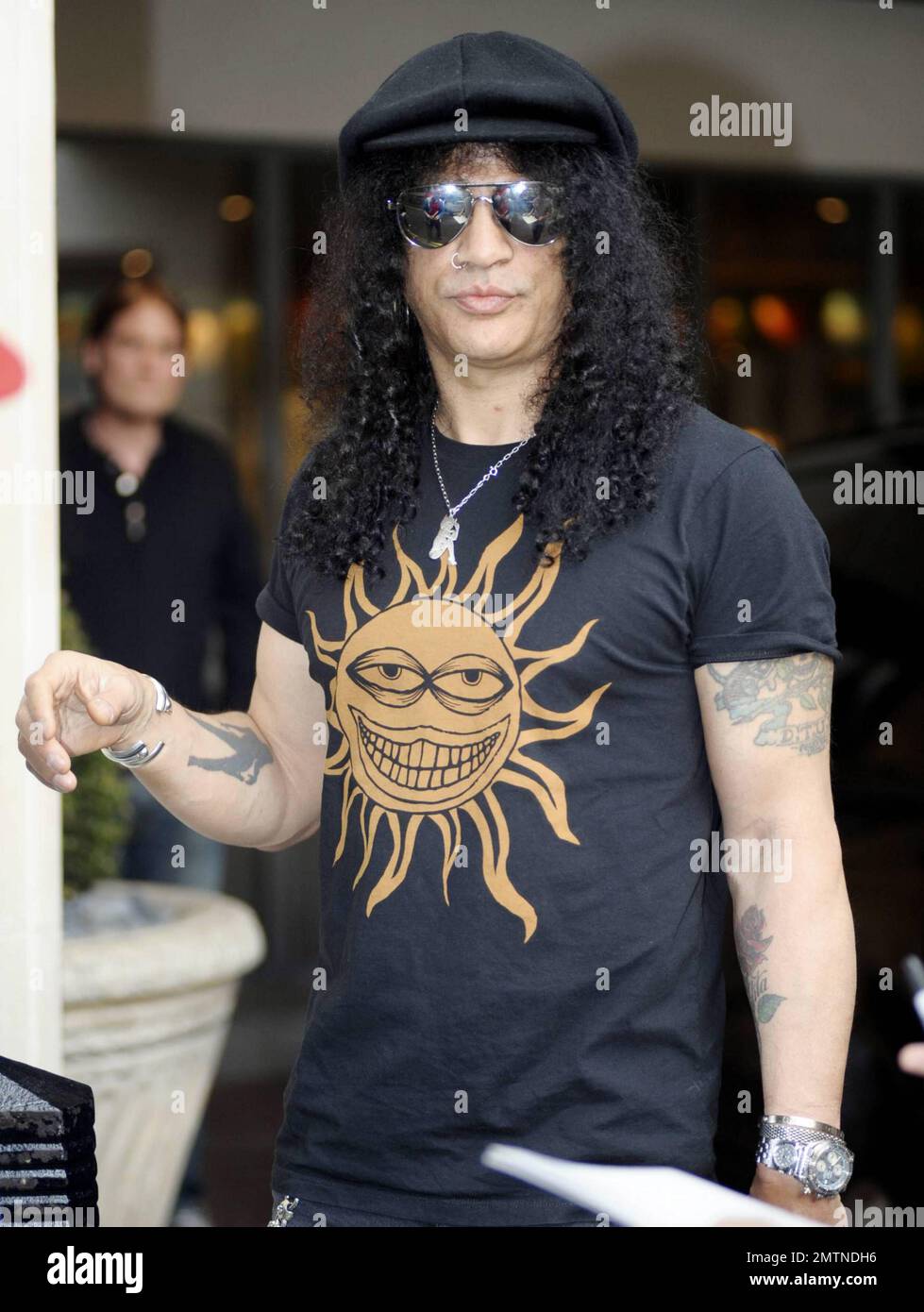 Rock guitarist Slash Saul Hudson sans his trademark top hat