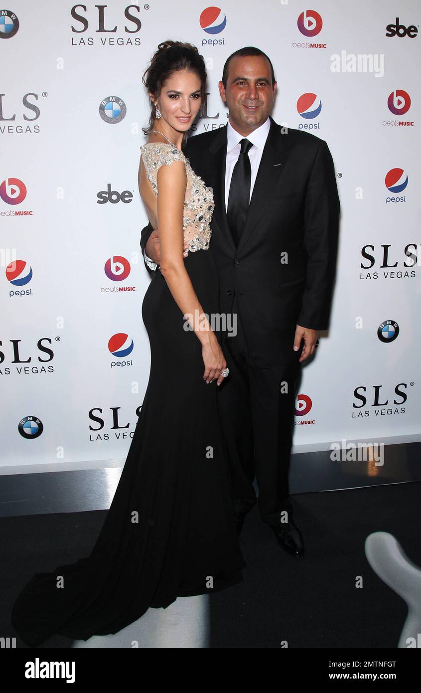 Emina Cunmulaj and Founder, Chairman and CEO of sbe, Sam Nazarian at the SLS Las Vegas Grand Opening Celebration in Las Vegas, NV. August 22, 2014. Stock Photo