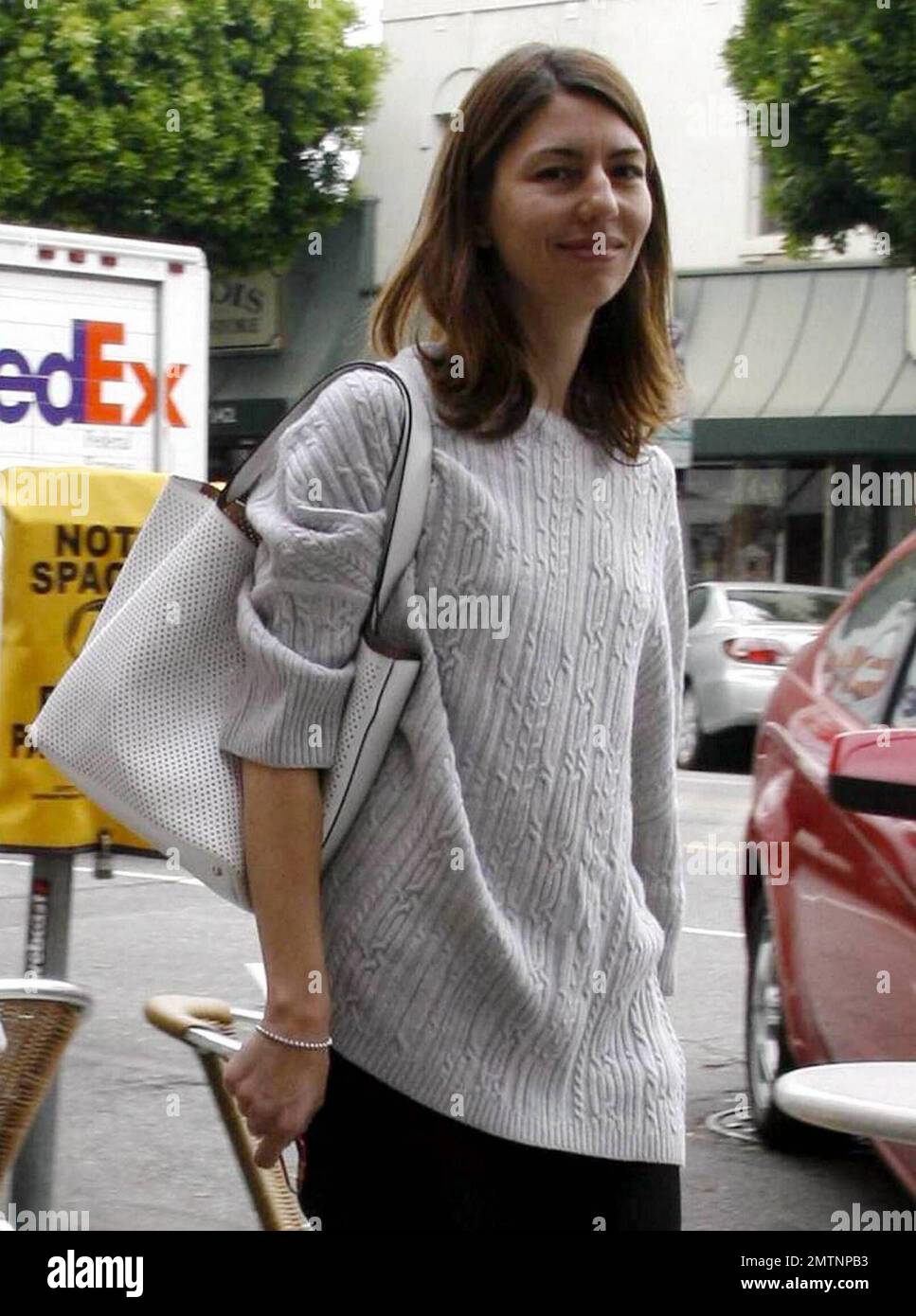 Exclusive!! Academy Award-winning screenwriter, actress and director Sofia  Coppola heads out for a stroll with a young friend in West Hollywood, CA.  6/10/09 Stock Photo - Alamy