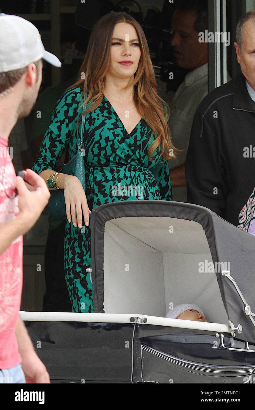 Sofia Vergara, Ed O'Neill and Jesse Tyler Ferguson were seen on set  shooting scenes for their TV series 'Modern Family.' Sofia wears a green  patterned dress with a fake baby bump as