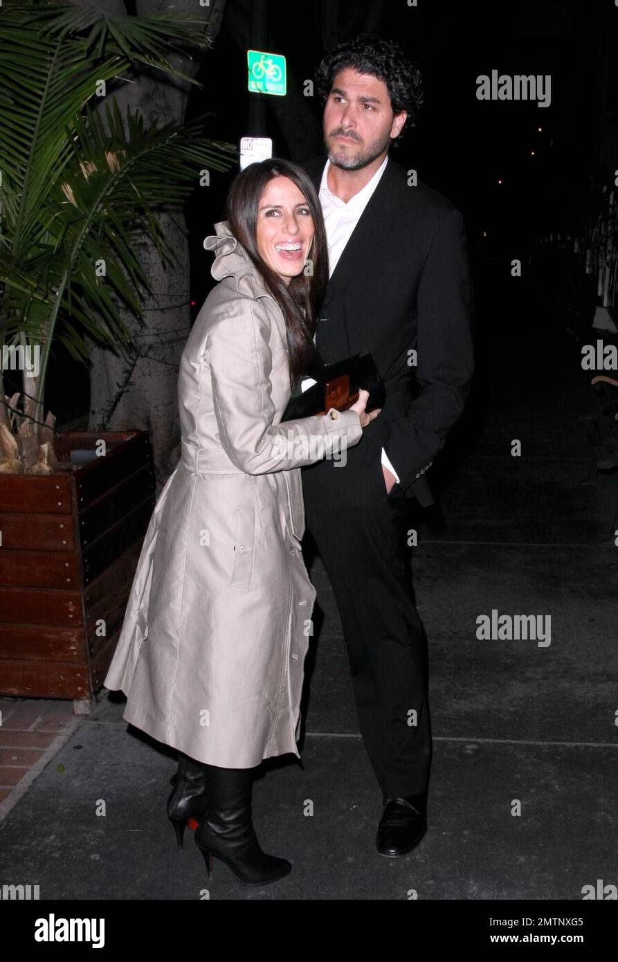 It's raining money on 'Punky Brewster' actress Soleil Moon Frye! The actress and producer Jason Goldberg leave the restaurant Madeos as a photographer tosses a hand full of dollar bills over Soleil's head as he asks her opinion on the state of the U.S. economy. Los Angeles, CA. 2/7/09. Stock Photo