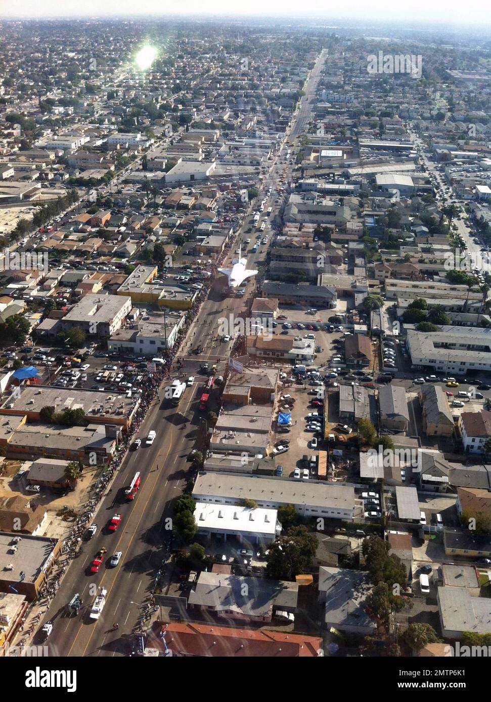 The Space Shuttle Endeavour is moved through the streets of Los Angeles ...