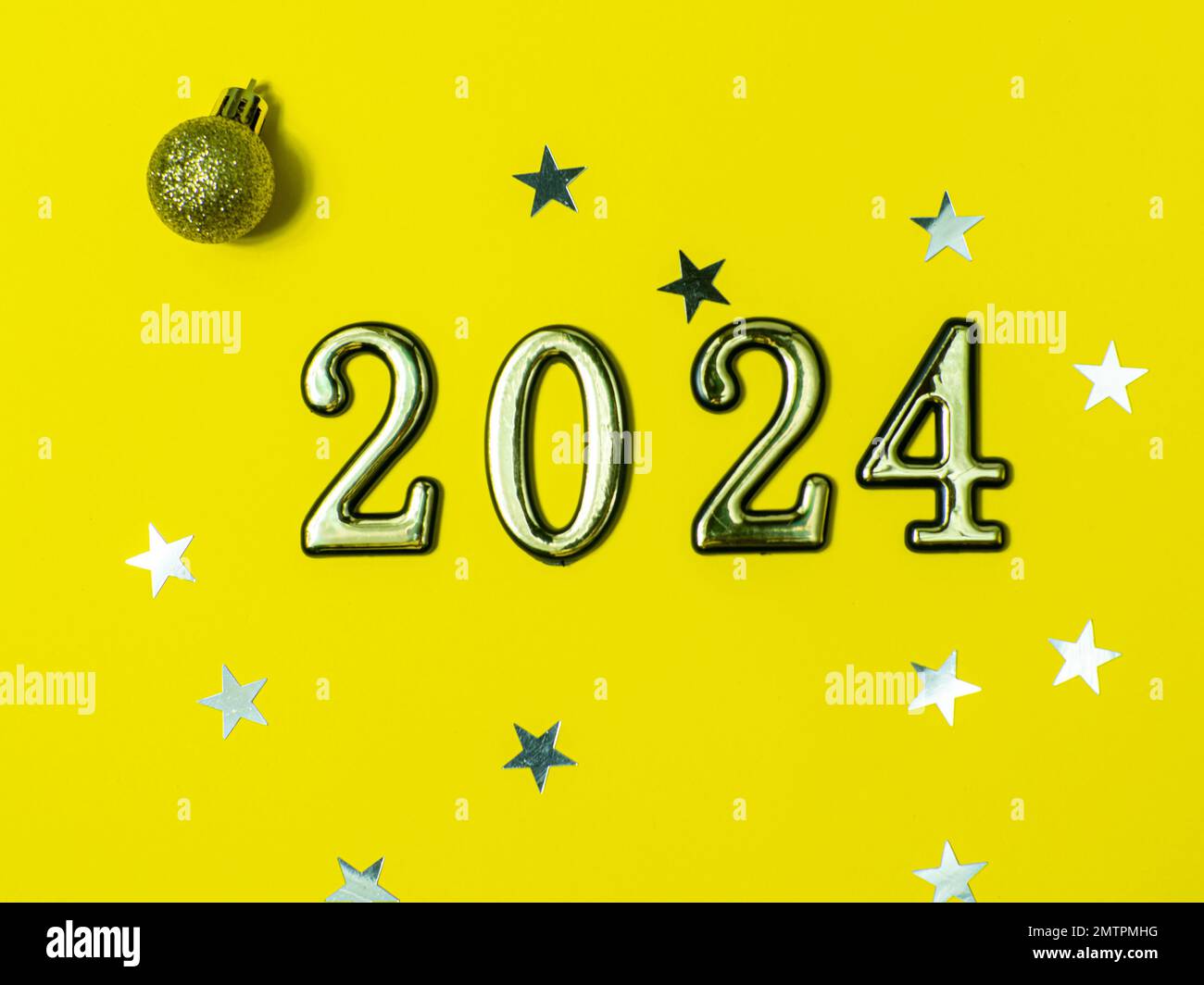2024 on yellow background Stock Photo - Alamy