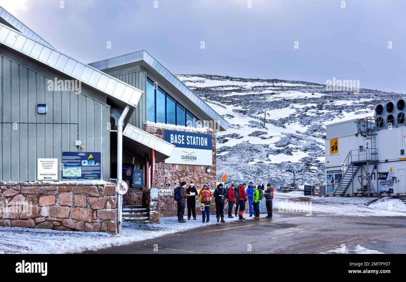 Cairngorm Mountain Aviemore Base Station building and a group of skiers Stock Photo