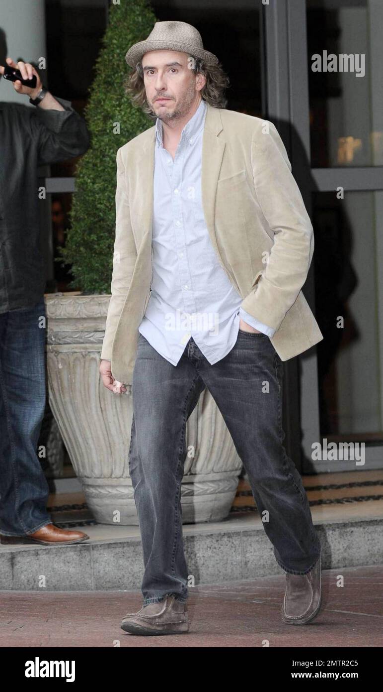 Actor, comedian, writer and producer Steve Coogan shows off his long ...