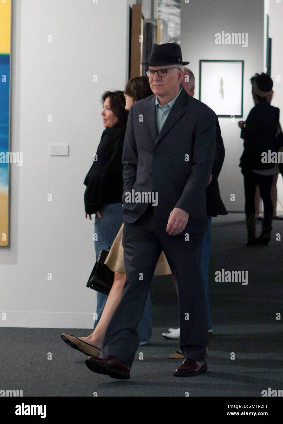 Actor, comedian and musician Steve Martin poses for photos while ...