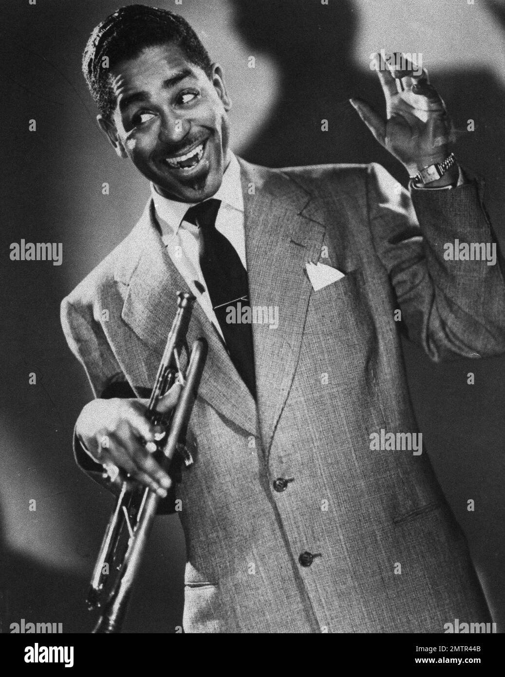 Orchestra leader and jazz trumpeter Dizzy Gillespie is pictured, March