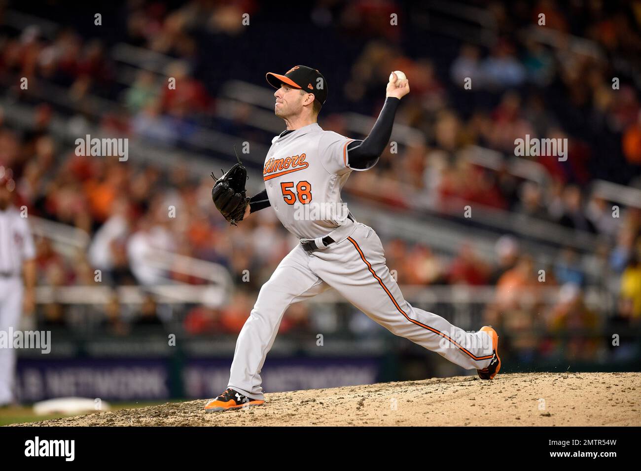 Baltimore Orioles relief pitcher Donnie Hart (58) pitches during an interleague baseball game against the Washington Nationals, Wednesday, May 10, 2017, in Washington