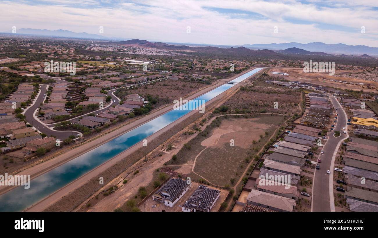 An aerial view of the Central Arizona Project and new homes in