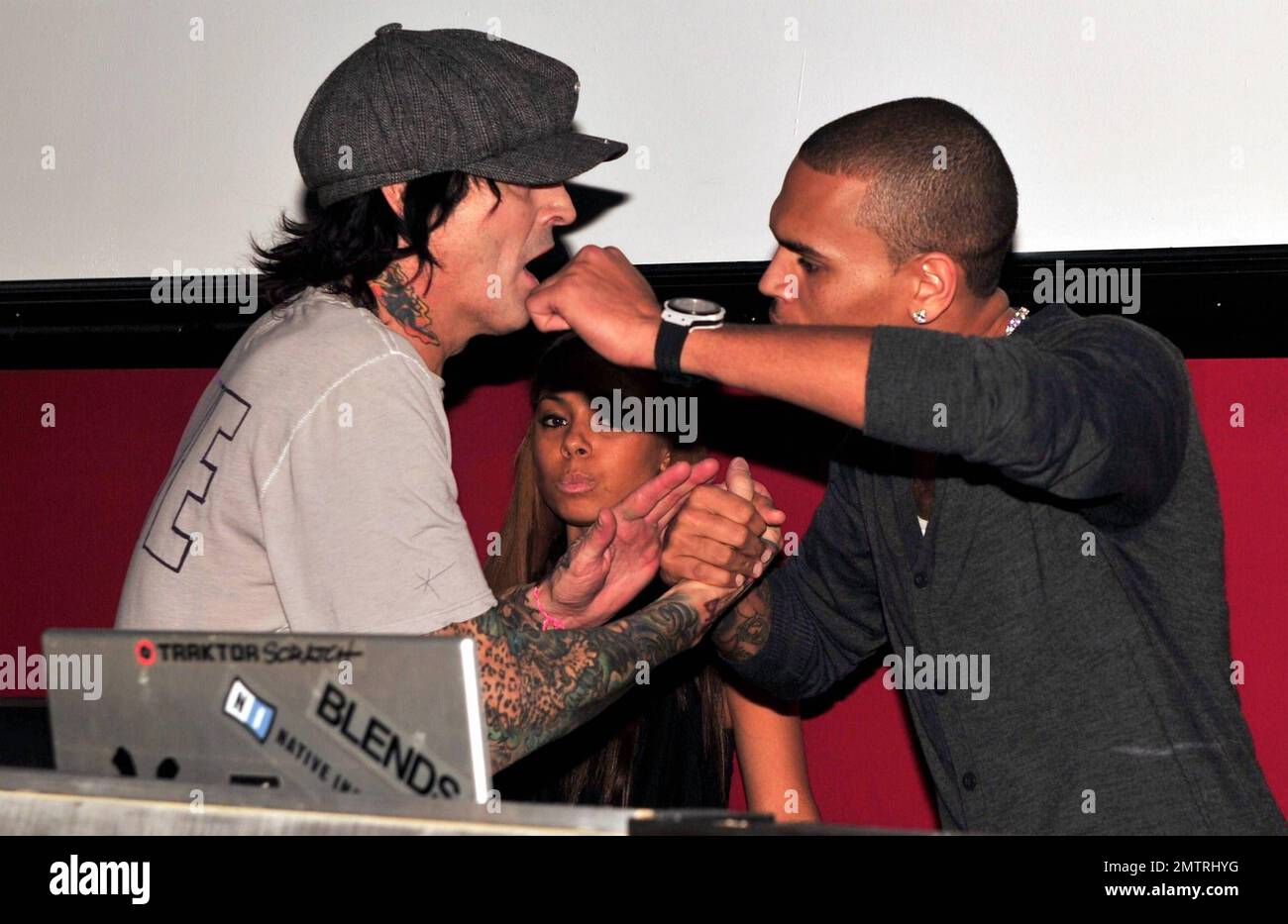 EXCLUSIVE!! Tommy Lee and Chris Brown share the stage and show admiration  for one another as Chris hosts the Super Bowl Celebrity DJ Bash with T-Pain  at Play Nightclub in Miami Beach,