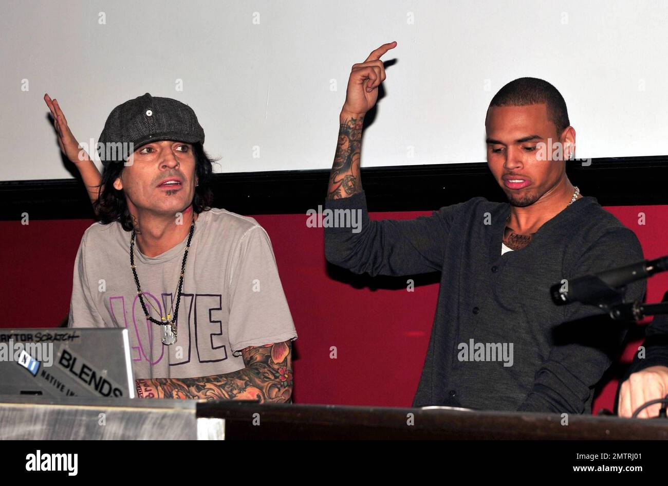 EXCLUSIVE!! Tommy Lee and Chris Brown share the stage and show admiration  for one another as Chris hosts the Super Bowl Celebrity DJ Bash with T-Pain  at Play Nightclub in Miami Beach,