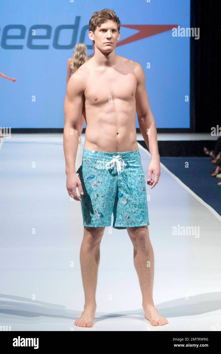 A model walks the runway showing off a Speedo design at Swimshow