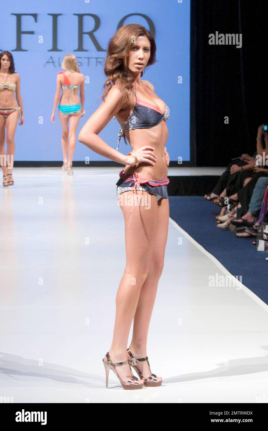 A model walks the runway showing off a Zafiro design at Swimshow Australia during Australian Swim Fashion Week held at Gold Coast Convention Centre. Gold Coast, Queensland, AUS. 03/24/11. Stock Photo