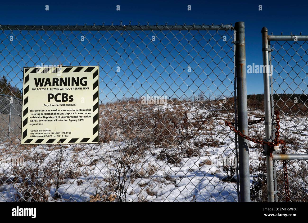 In this Wednesday, Dec. 21, 2016 photo, a sign warns of contaminated land at the site of the