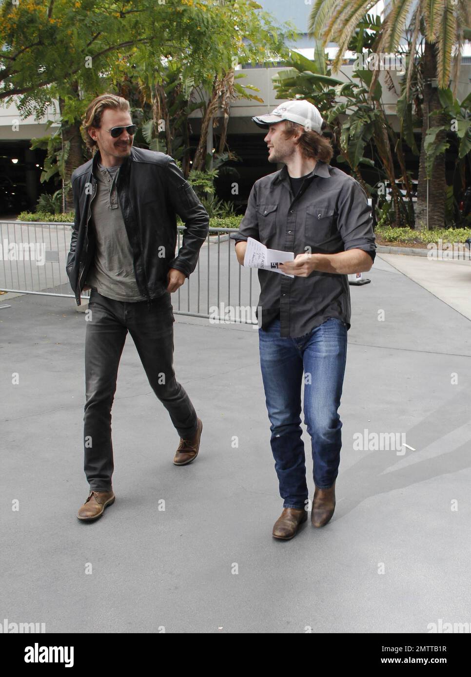 Actor Taylor Kitsch is spotted arriving at the Staples Center with a friend  to watch the LA Kings hockey game. Los Angeles, CA. May 24, 2014 Stock  Photo - Alamy