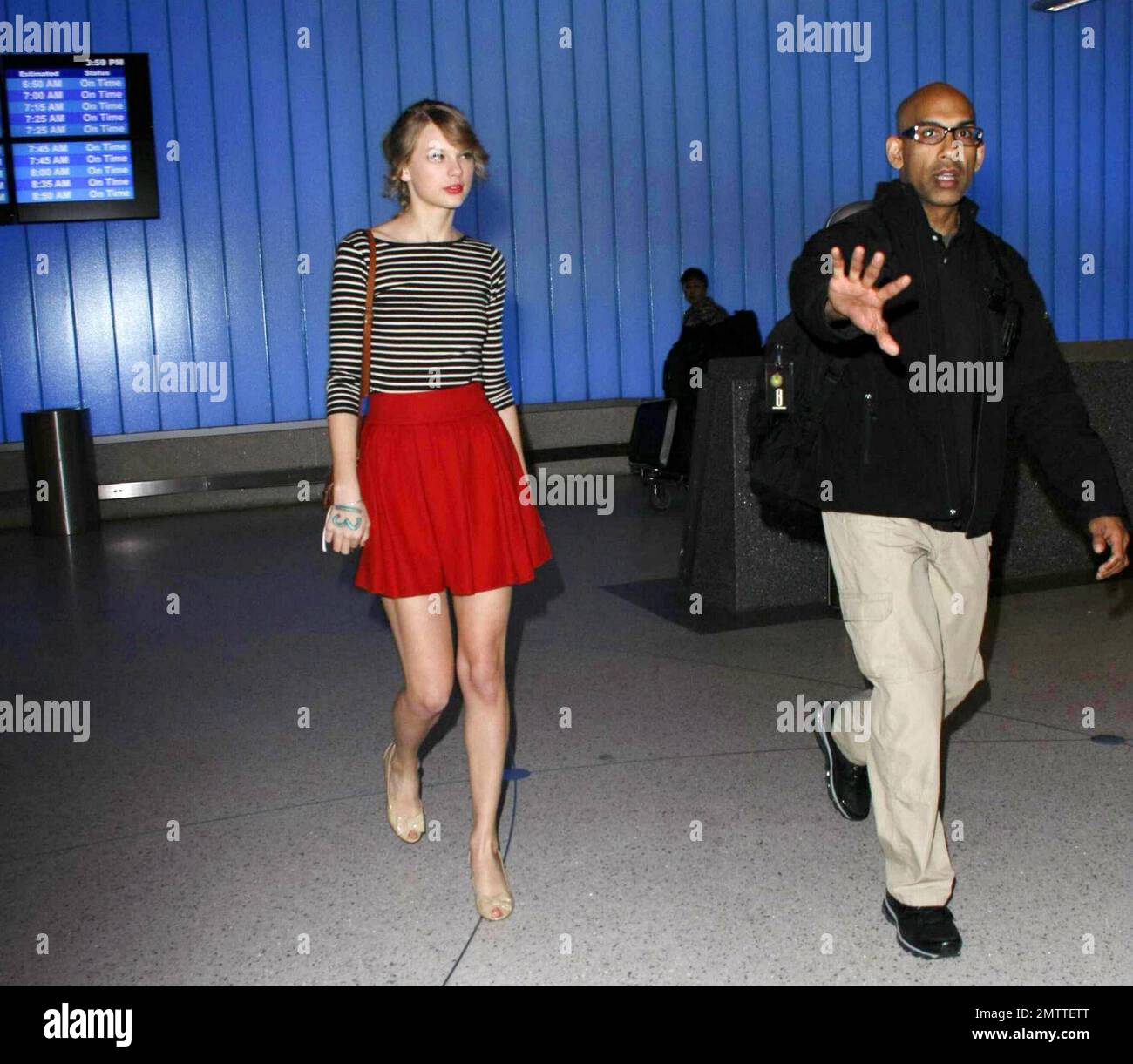 Pop country singer Taylor Swift arrives at LAX after flying in from Hong  Kong where she wrapped up the Asian portion of her Speak Now tour. Swift,  who looked fresh and fabulous