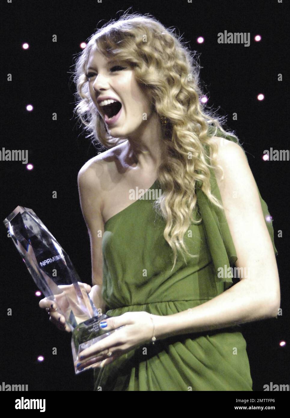 Taylor swift performing green dress hi-res stock photography and images -  Alamy