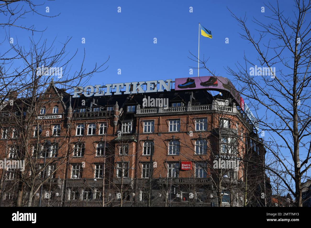 Copenhagen/Denmark/01 February 2023/ Danish media Politken hus  and few other daily papes stand with ukiran, media house fly ukrianina flg on house soliditary  with ukrainian crisis  Copenhagen Denmark.  (Photo. Francis Joseph Dean/Dean Pictures) Stock Photo