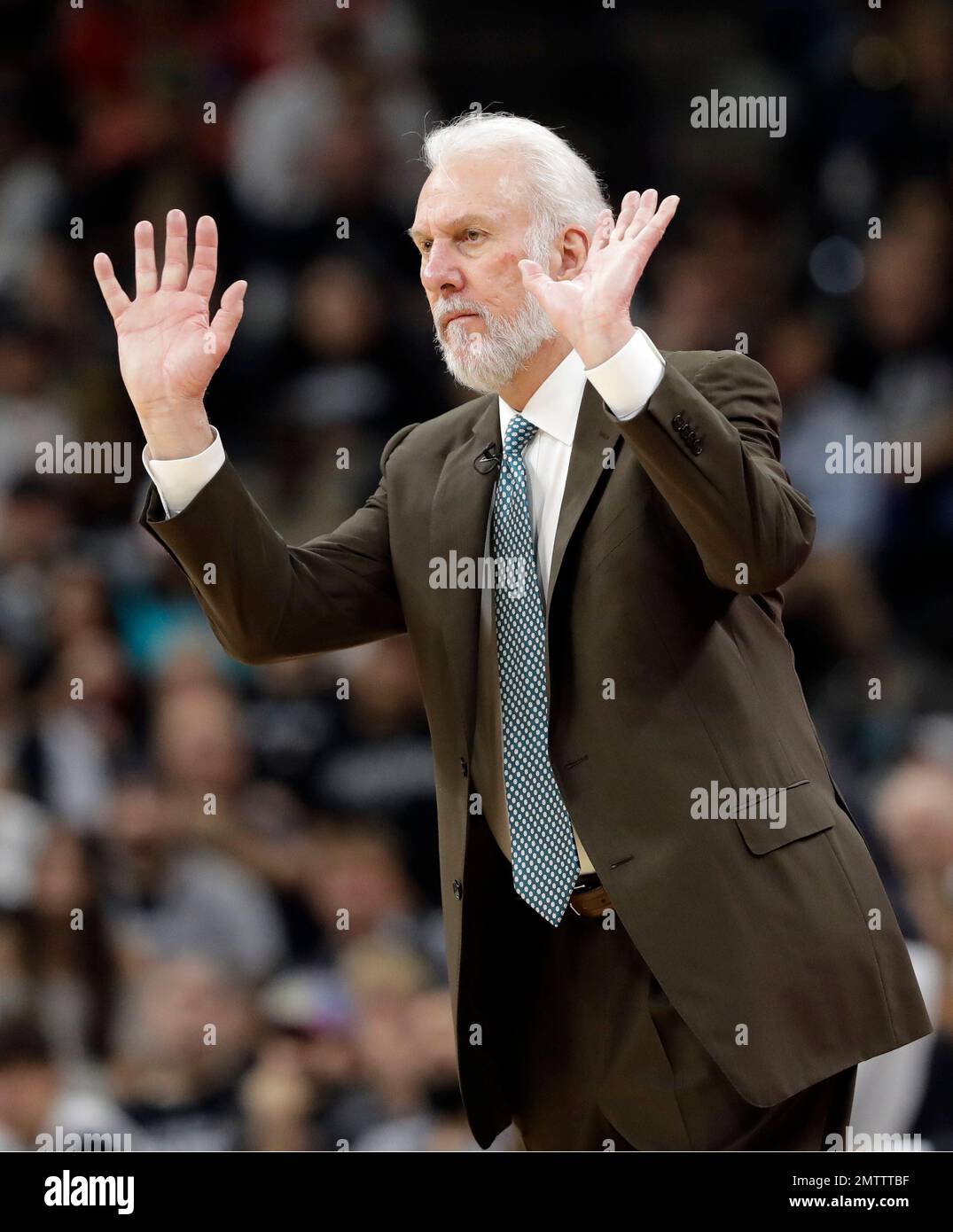 San Antonio Spurs head coach Gregg Popovich reacts to play against the