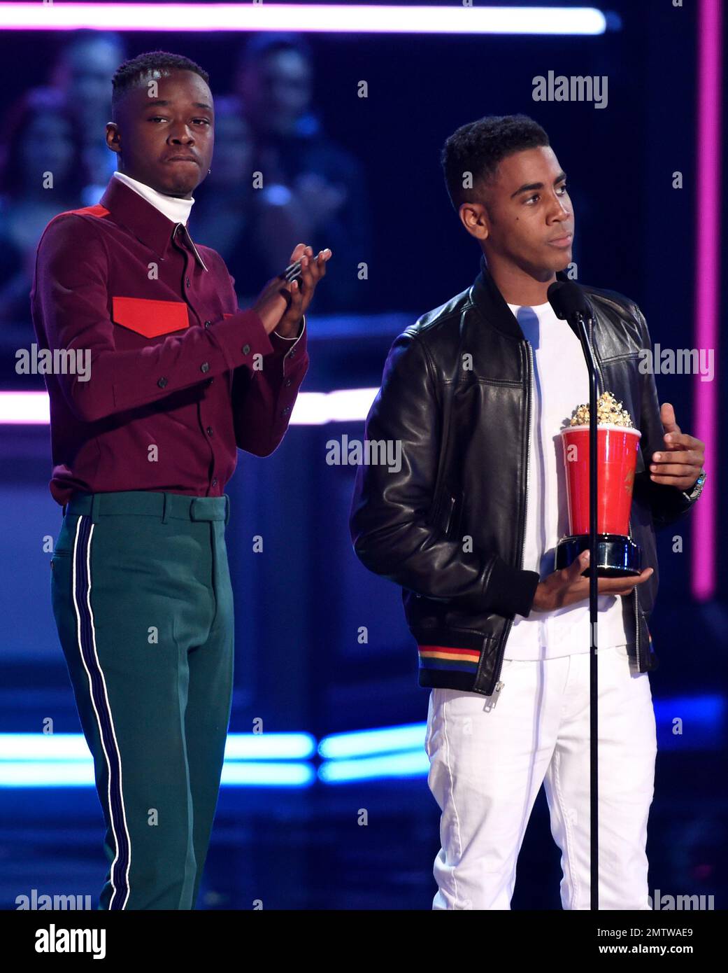 Ashton Sanders, left, and Jharrel Jerome accept the award for best kiss