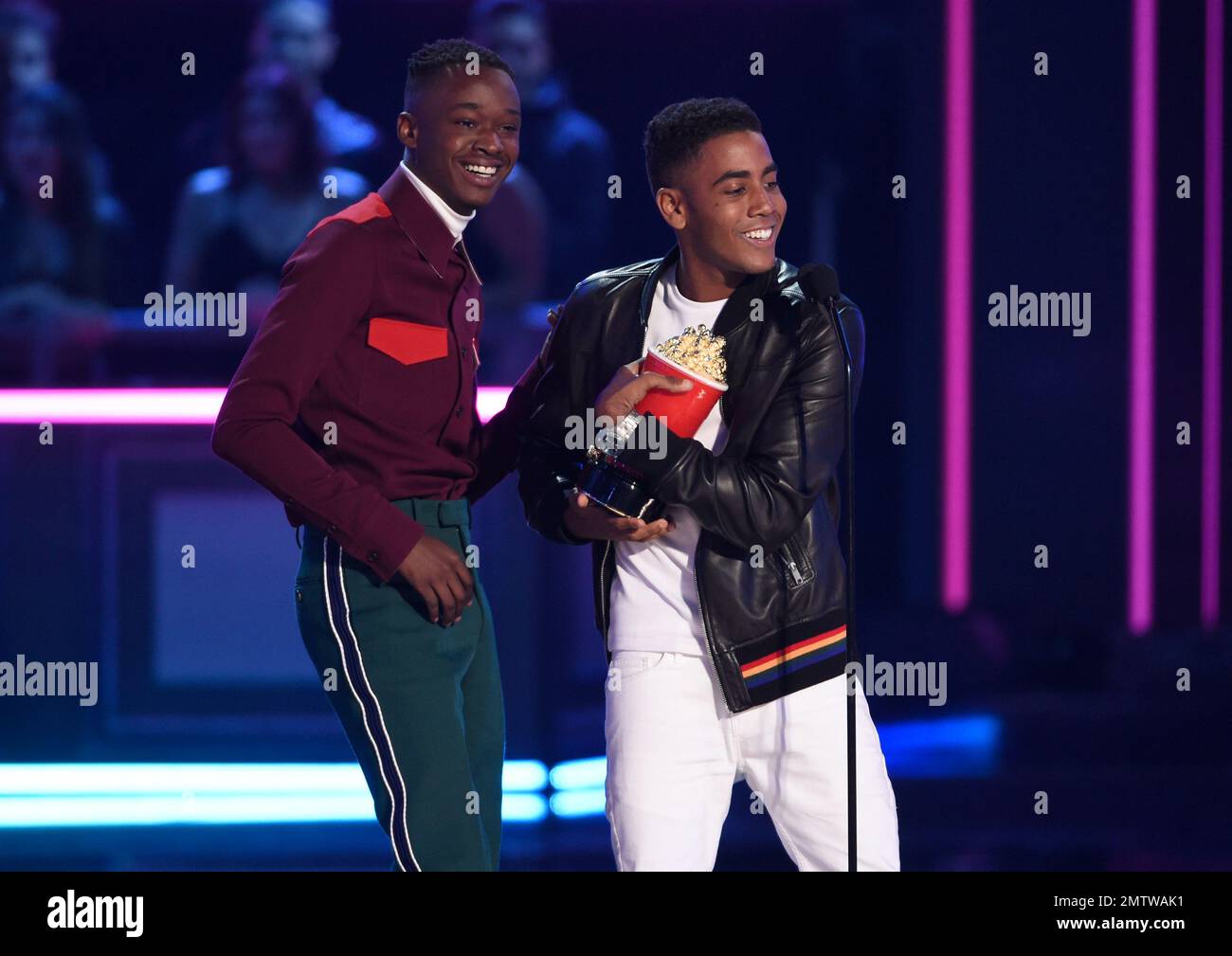 Ashton Sanders, left, and Jharrel Jerome accept the award for best kiss